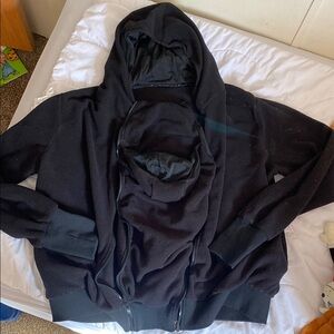 Baby wearing zip up hoodie with pockets